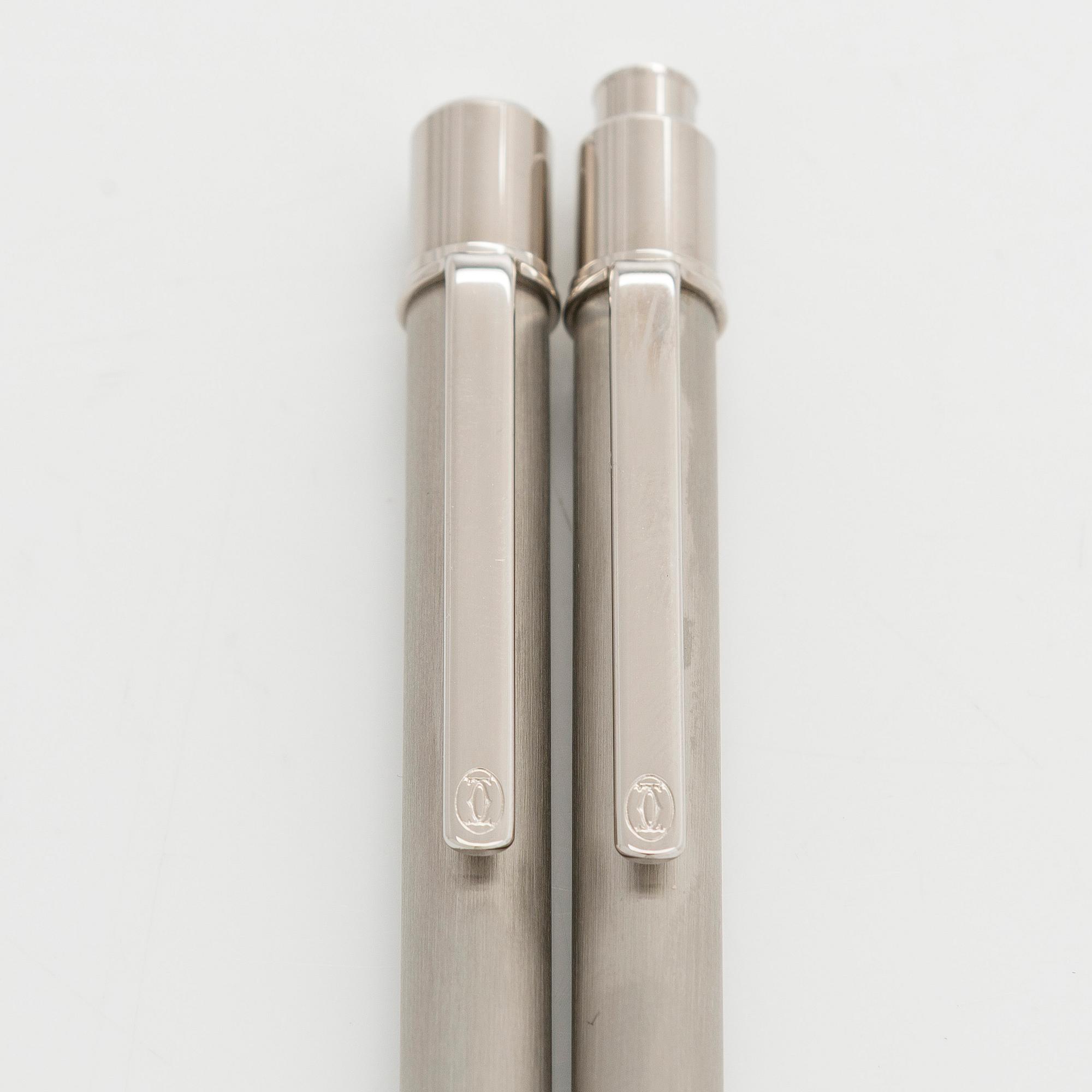 Cartier, pennor, 2 st, "must de Cartier".