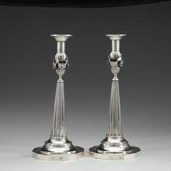A pair of German late 18th century silver candlesticks, makers mark possibly Johann Georg Fournier II, Berlin.