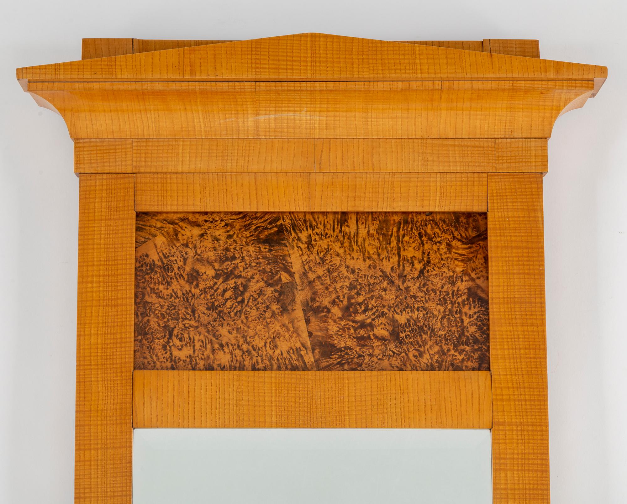 A 19th century birch mirror.