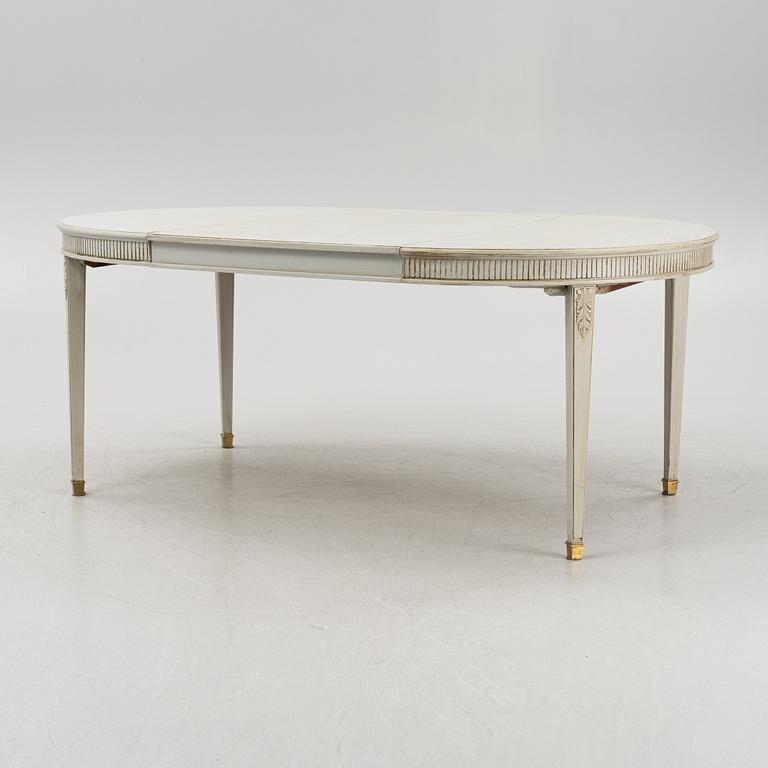 A Gustavian style dining table, mid 20th century.