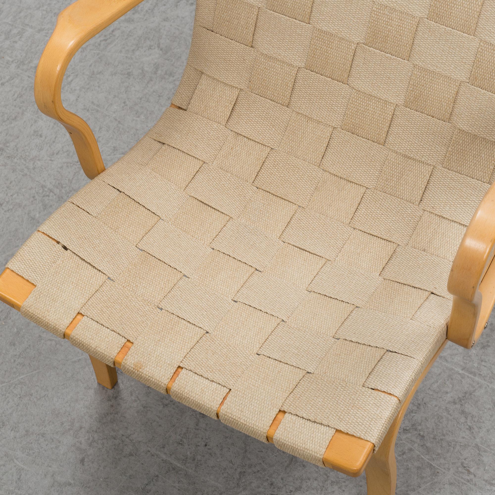 An 'Eva' easy chair by Bruno Mathsson for Dux.