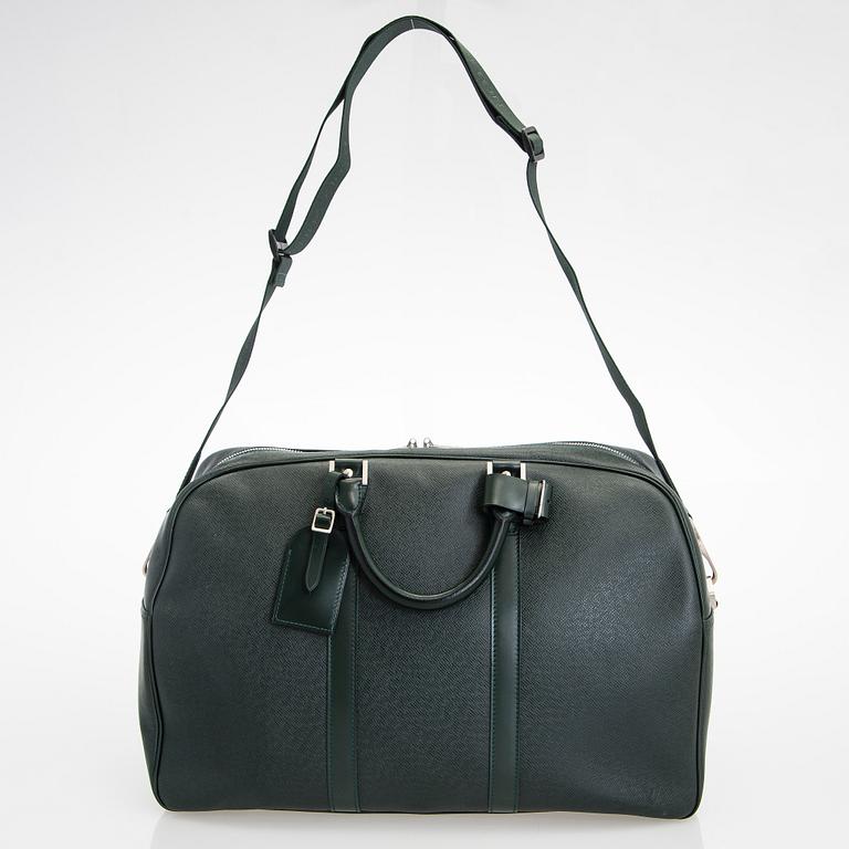 Louis Vuitton, a 'Taiga Kendall PM' bag.