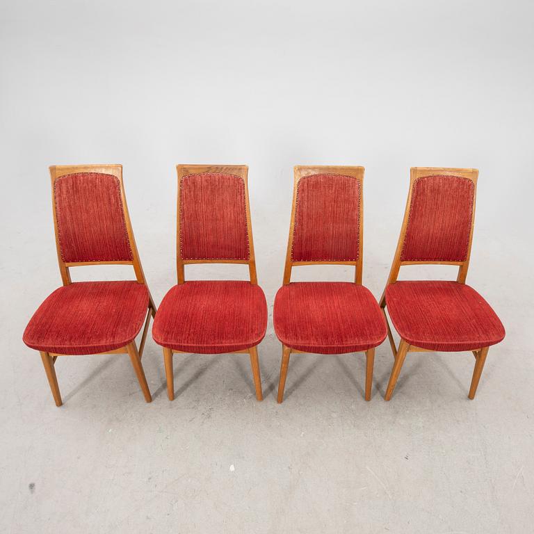 A set of four  mid 1900s teak chairs.
