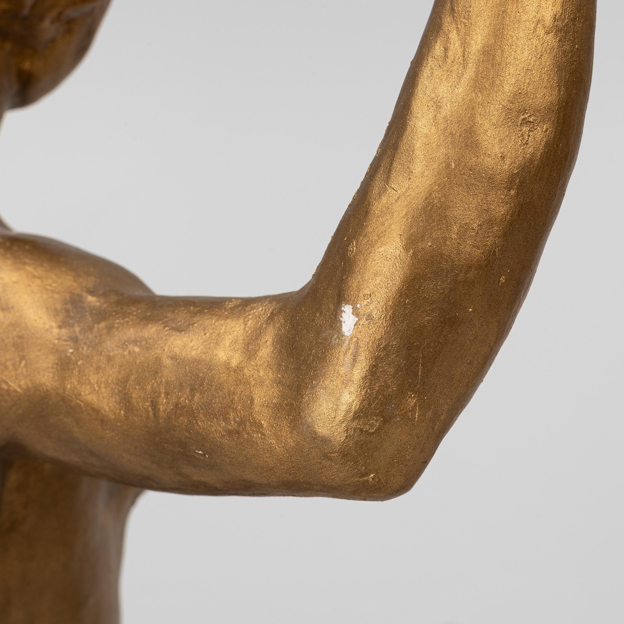 Decorative sculptures, a pair, 1920s/30s.