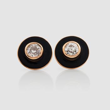 1230. A pair of black enamel and old-cut diamond earrings. Total carat weight circa 1.00 ct.