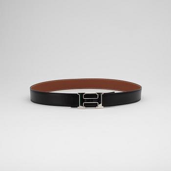 HERMÈS, a reversible leather belt.