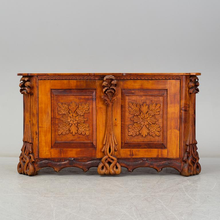 KNUT FJAESTAD, a folk art sideboard, Sweden, the former part of the 20th C.