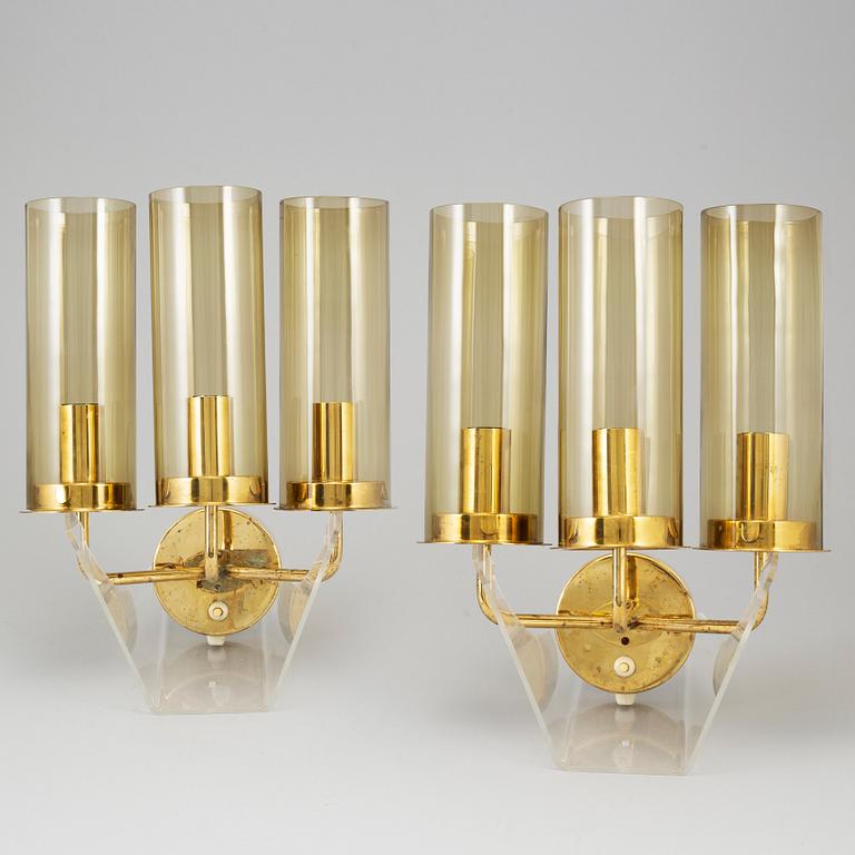 A pair of brass and glass wall sconces by Hans-Agne Jakobsson, Markaryd, second half of the 20th century.