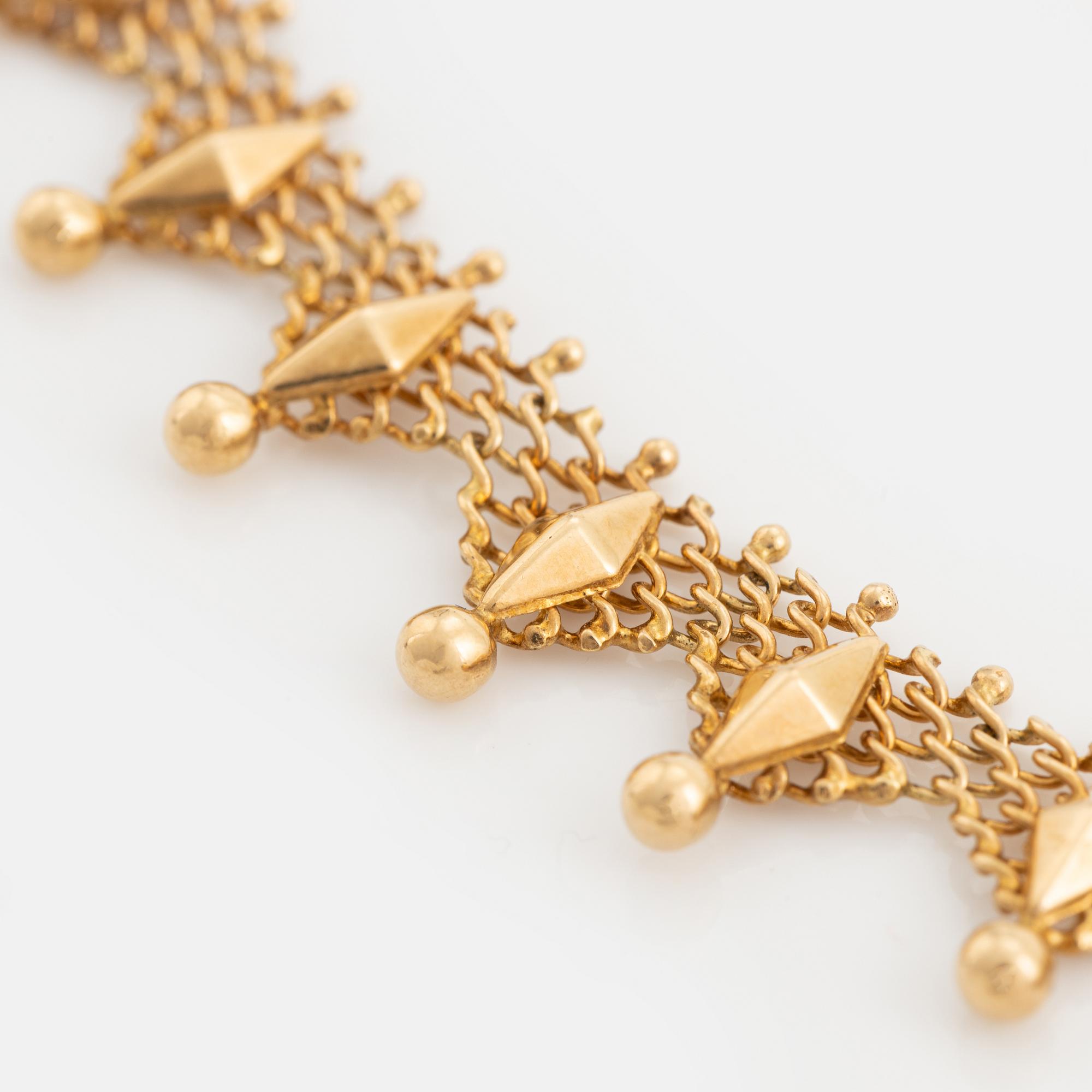 Collier 18K guld.