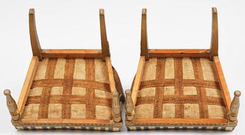 A pair of late Gustavian open armchairs attributed to E. Ståhl (master in Stockholm 1794-1820).