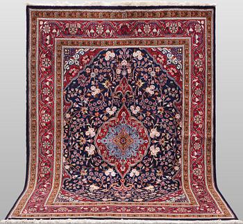 A Saruk carpet, 205 x 152 cm.
