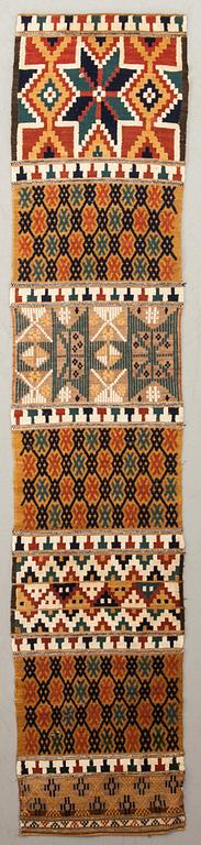 TAPESTRY Skåne Sweden, flatweave (bl.a. rölakan), late 19th century. 241 x 49 cm.