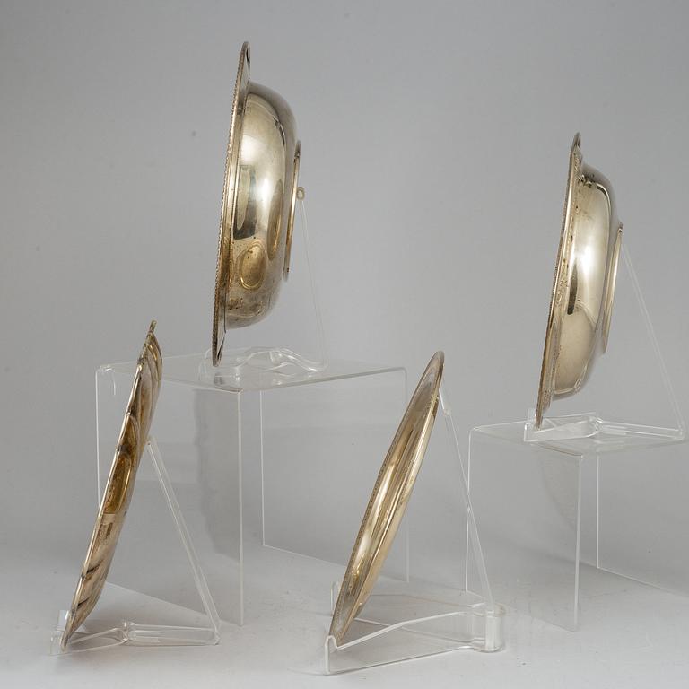 Four 20th century American silver-gilt sterling dishes.