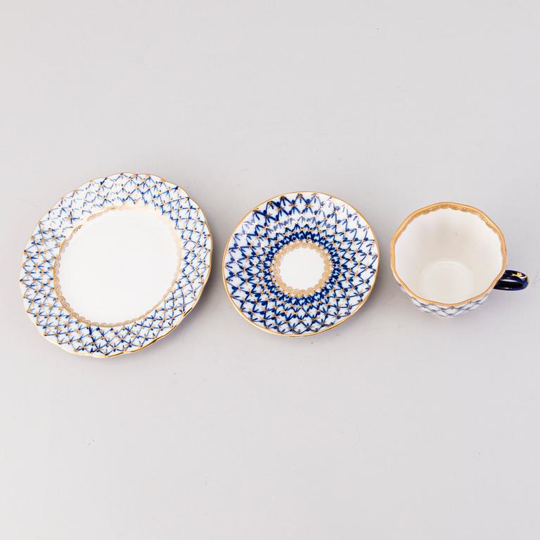 A 22-piece Lomonosov Cobalt Net porcelain set for coffee and tea, USSR.