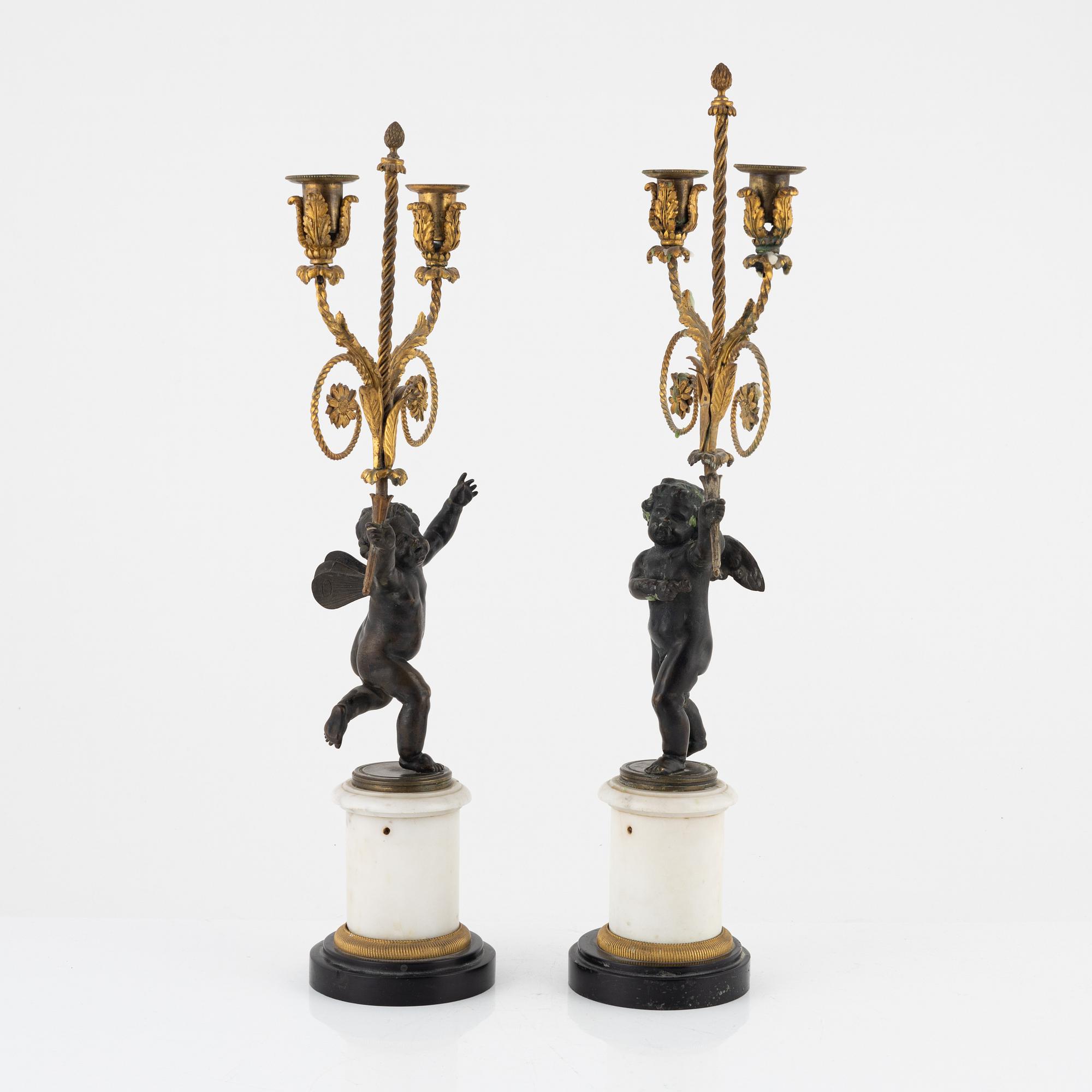 A pair of Louis XVI style candelabra, 19th Century.