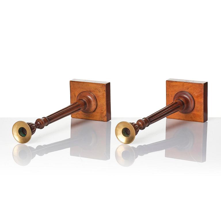 A pair of George III mahogany candlesticks, circa 1800.
