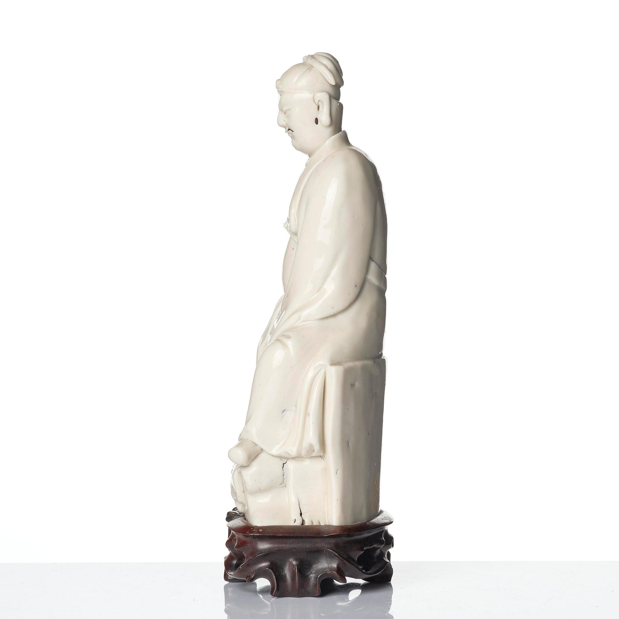 A blanc de chine figure of Guandi, Qing dynasty, 18th century.