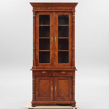 A display cabinet, late 19th century.