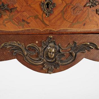 A Louis XV-style marquetry commode, first part of the 20th century.