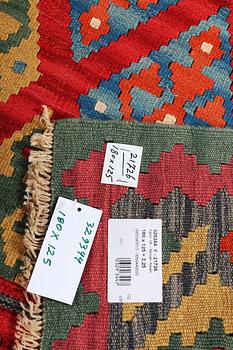 A Kilim rug, c. 180 x 125 cm.