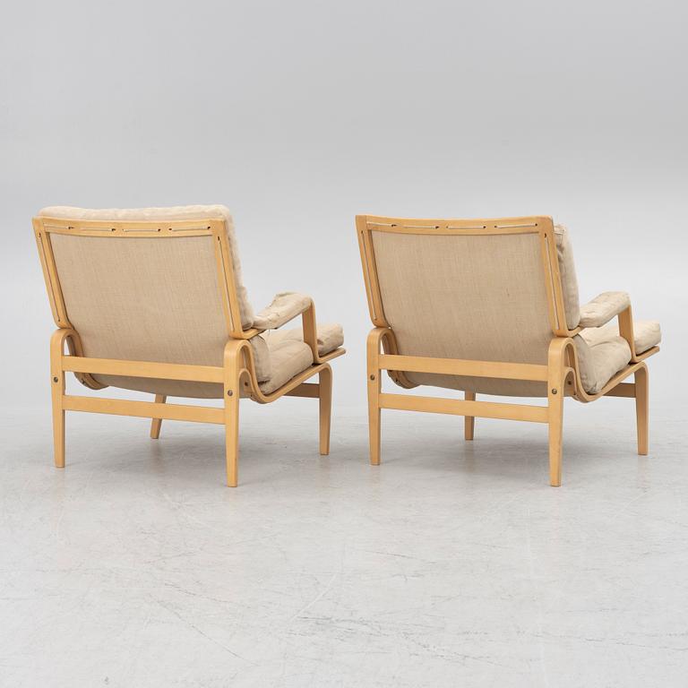 Bruno Mathsson, a pair of 'Ingrid' armchairs, Dux.