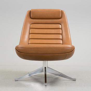 A "Manzù Lounge Chair" by Pio Manzu for Alias.