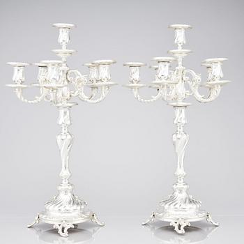 A pair of Swedish silver candelabra, mark of Gustaf Möllenborg (Carl Teodor Feron), Stockholm 1896.