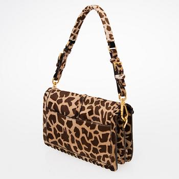 An Animal Print Pony Hair Shoulder Bag.