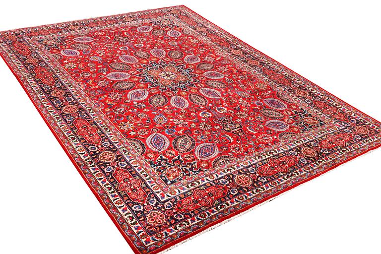 A Keshan carpet, c. 355 x 245 cm.