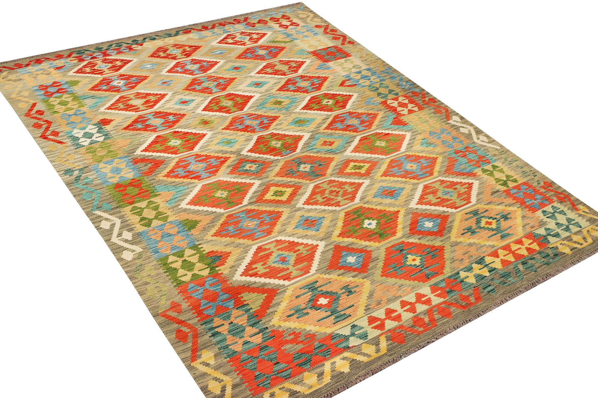 An Afghan Kilim carpet, c. 305 x 200 cm.