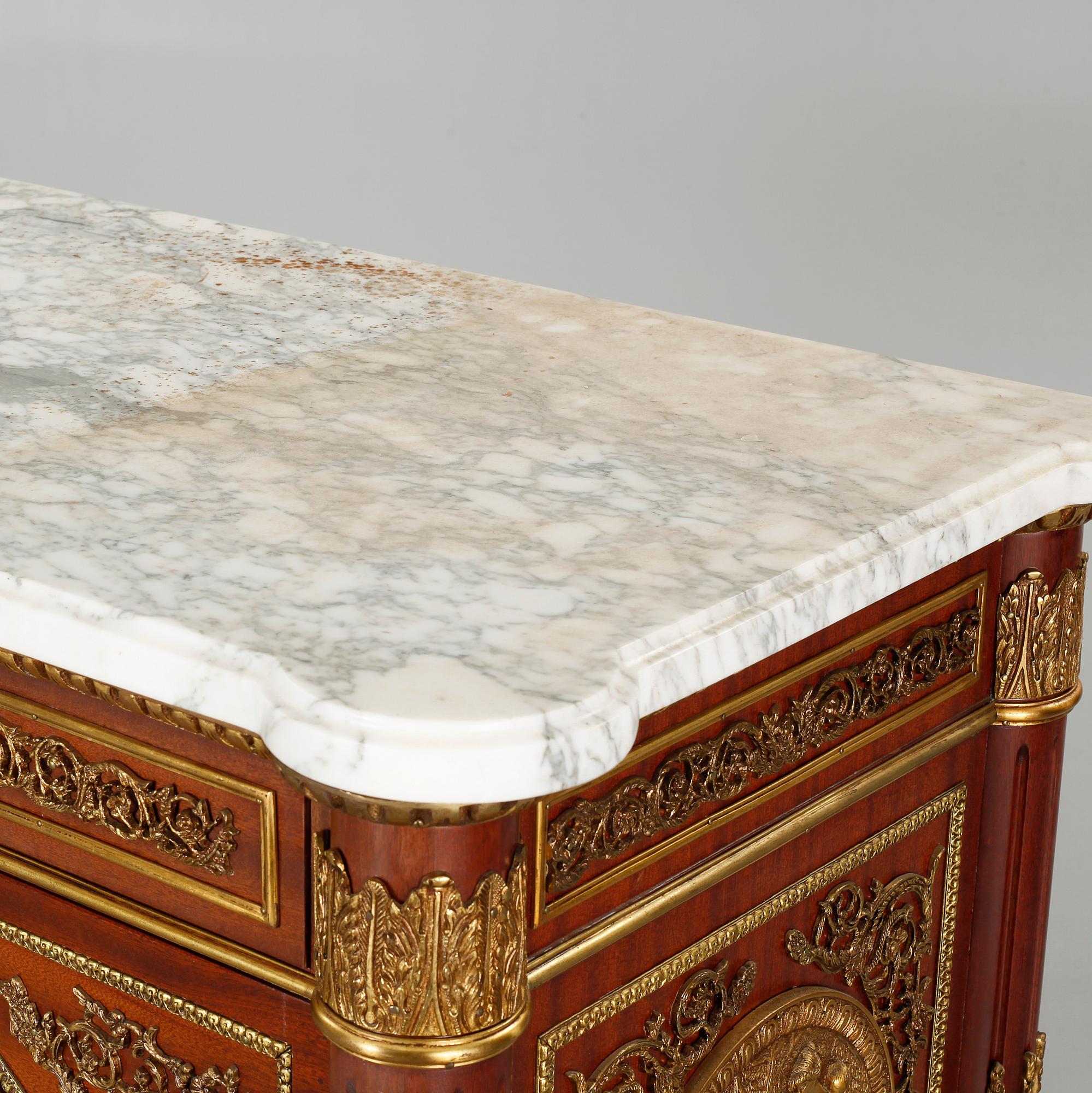 A Louis XVI style chest of drawers, second half of the 20th century.