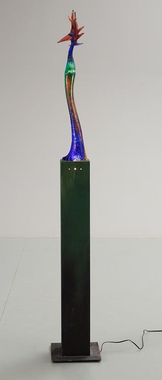 A unique Kjell Engman sand cast glass sculpture of a bird, iron base, on wooden electrified stand, Kosta Boda, Sweden 2002.