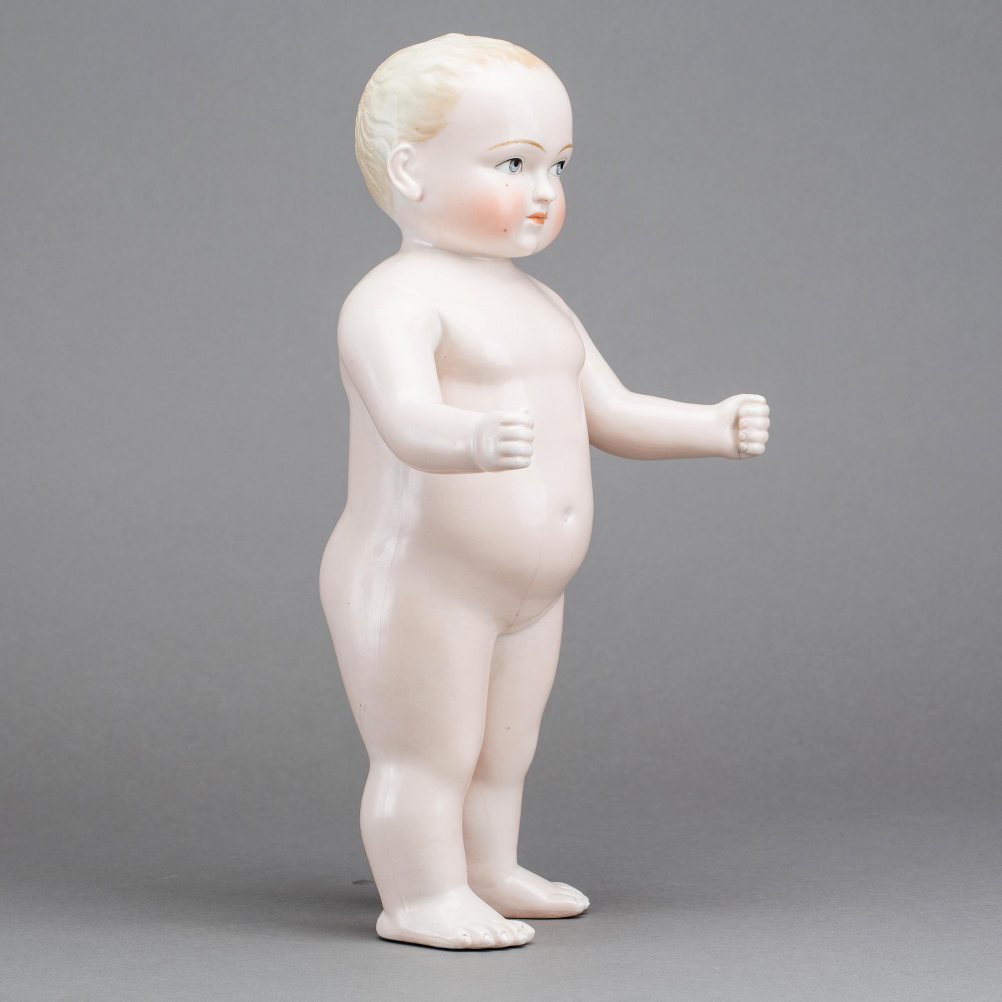 A PORCELAIN FROZEN CHARLIE DOLL from around 1900. Bukowskis