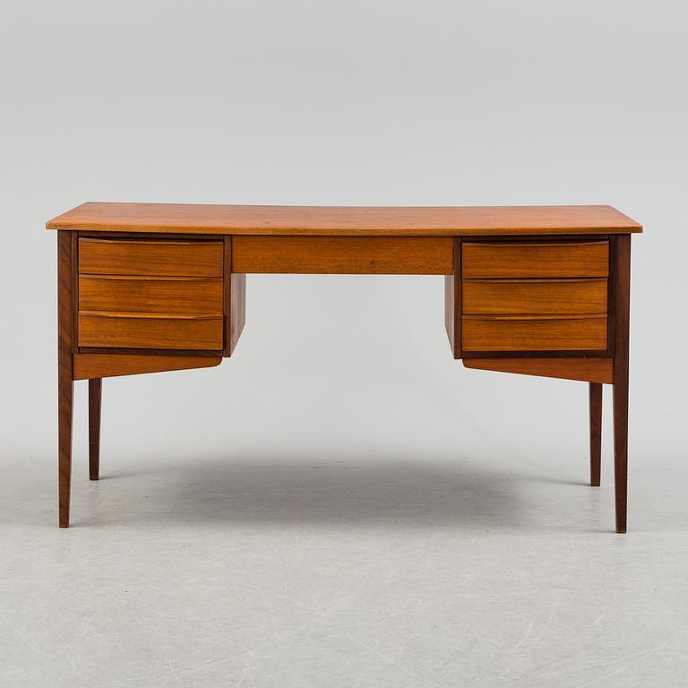 A second half of the 20th century teak writing desk.