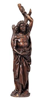 1517. A wooden sculpture depicting St Sebastian, probably German, circa 1500.