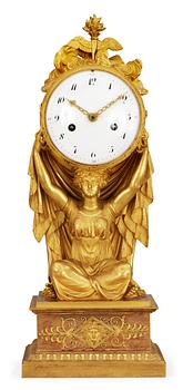 631. A French Empire early 19th century gilt bronze mantel clock.