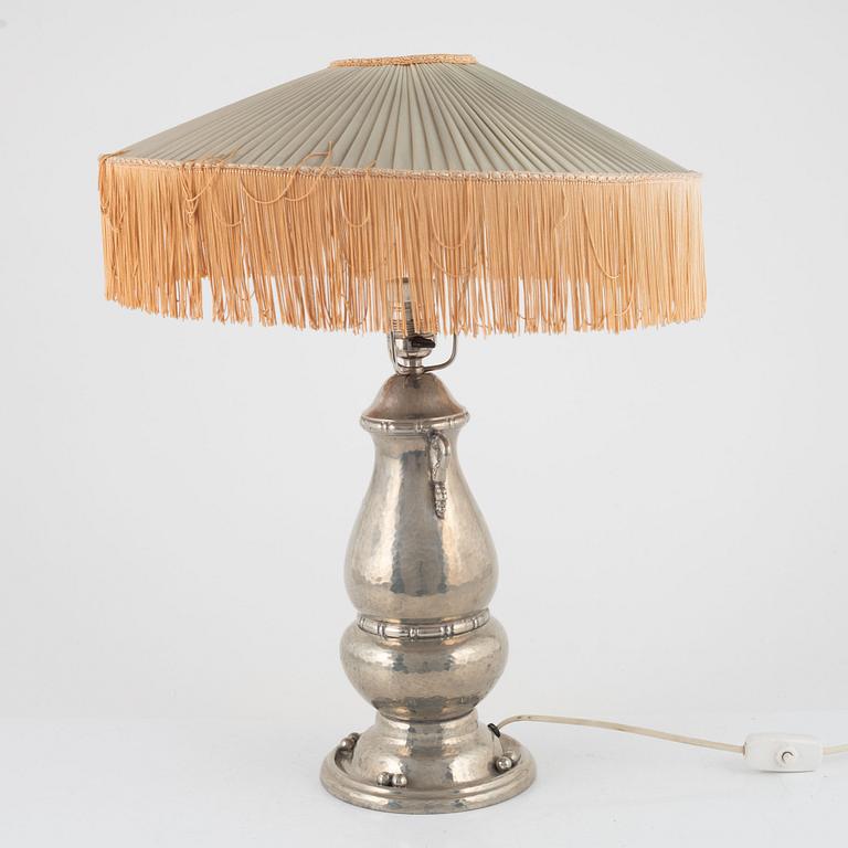 A pewter table lamp, first half of the 20th Century.