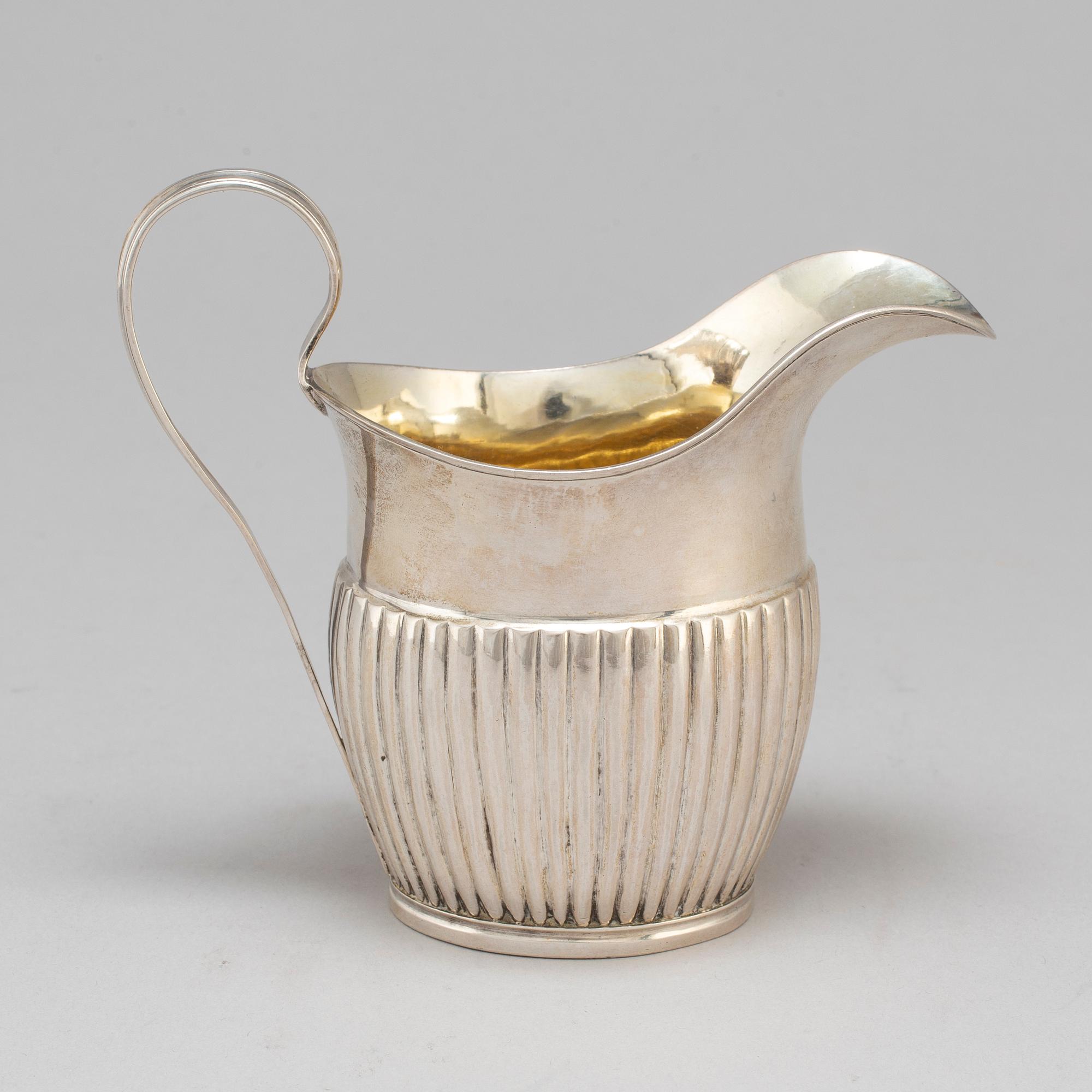 A silver creamer by JL Klint, Norrtälje 1828.