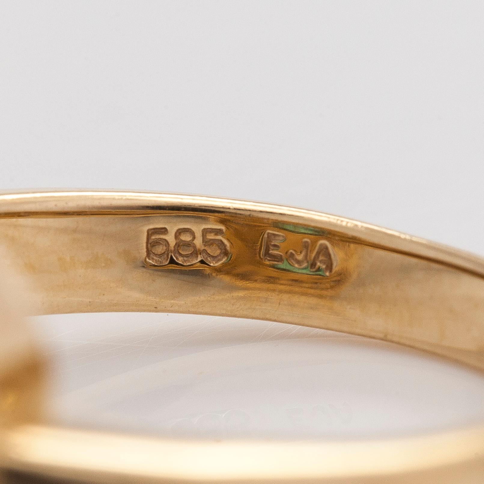 Ring, 14K gold, with an emerald and diamonds. Finnish import marks 1997.