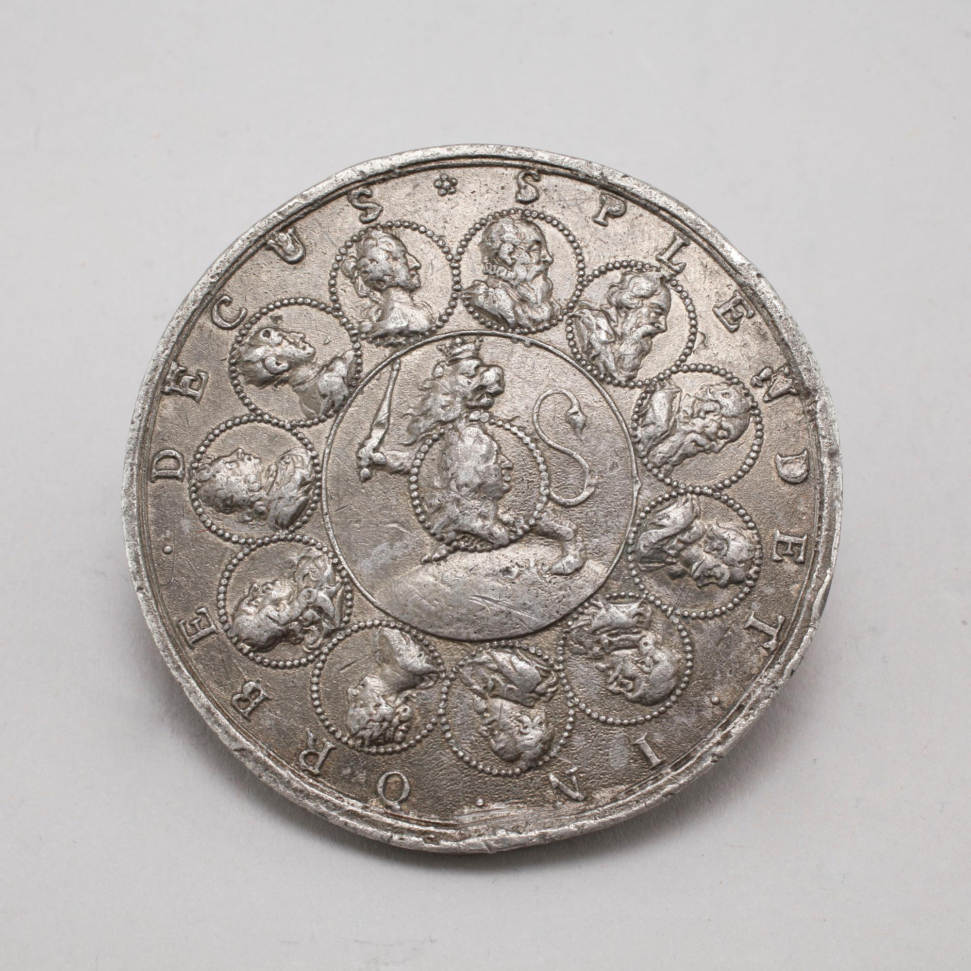 Two pewter medallions, 18th century.