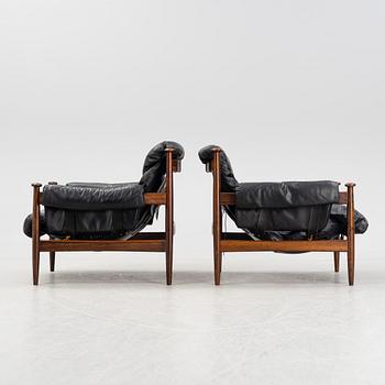 A pair of 'Amiral' rosewood easy chairs by Eric Merthen for IRE, 1960s.