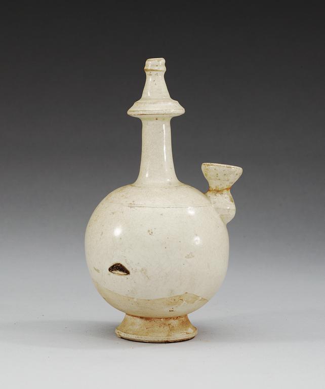 A white glazed ewer, presumably Tang dynasty.
