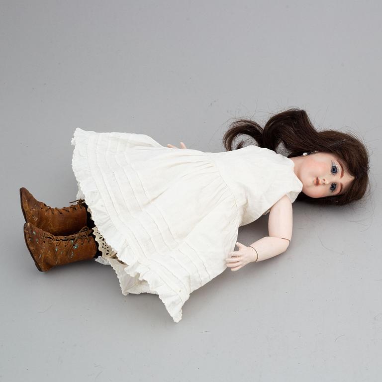 A Jullien Jeune bisque head doll.