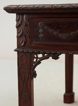 An English 18th century mahogany library table in the manner of Thomas Chippendale.