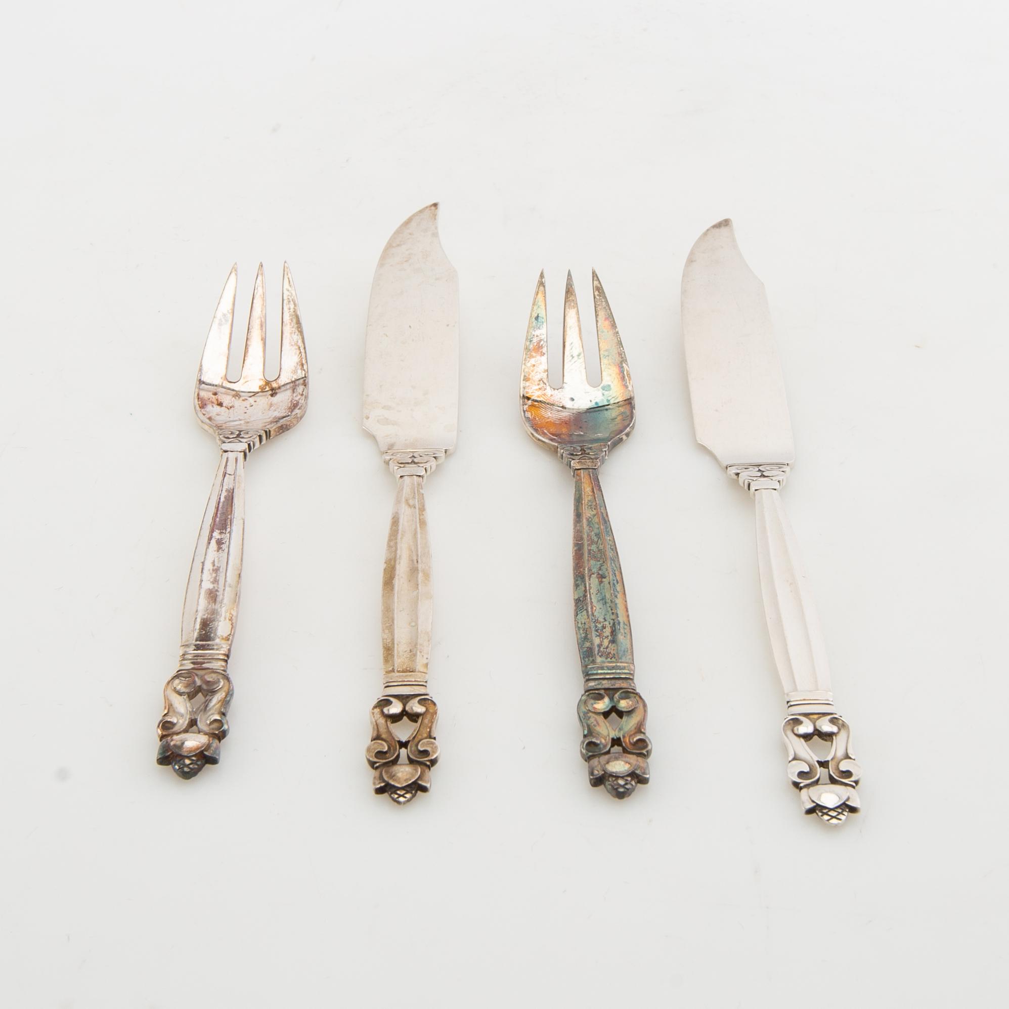 Johan Rohde, fiskebestick 12 dlr "Konge/Achorn" sterlingsilver för Georg Jensen efter 1945.