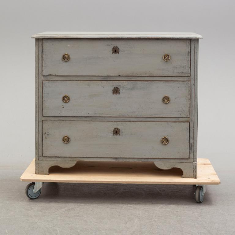 A mid 19th century painted chest of drawers.