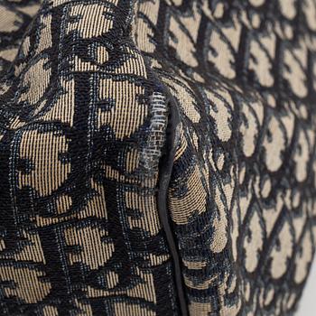 Christian Dior, a canvas handbag, toilet bag and key holder.