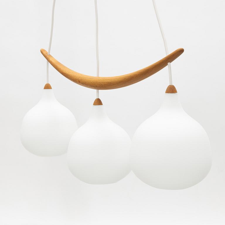 Uno & Östen Kristiansson, a 'Bananen' oak and glass three-light ceiling lamp, Luxus, Vittsjö.