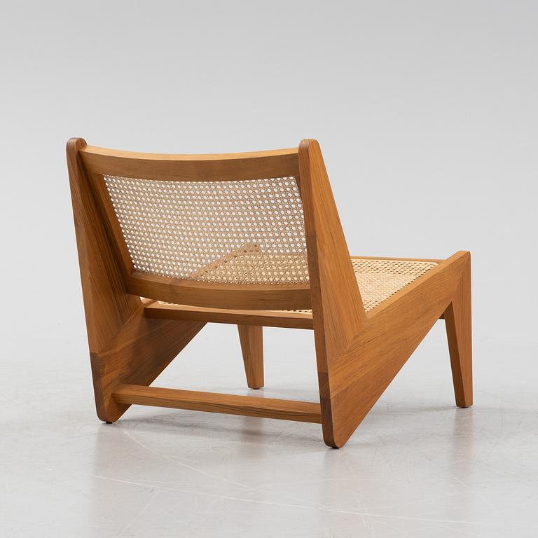 Pierre Jeanneret, a teak and rattan '058 Kangaroo' easy chair, Cassina, Italy.