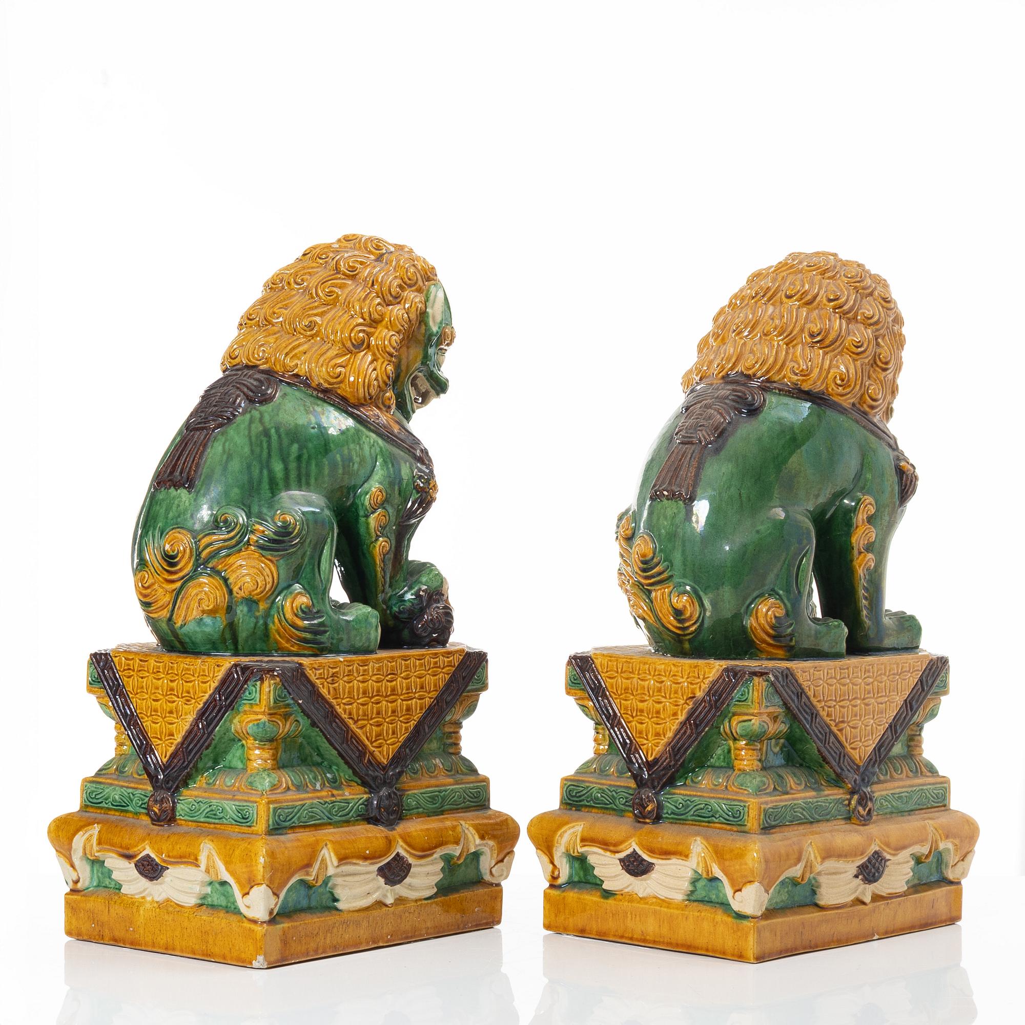 A pair of large figures of buddhist lions, China, second half of the 20th Century.